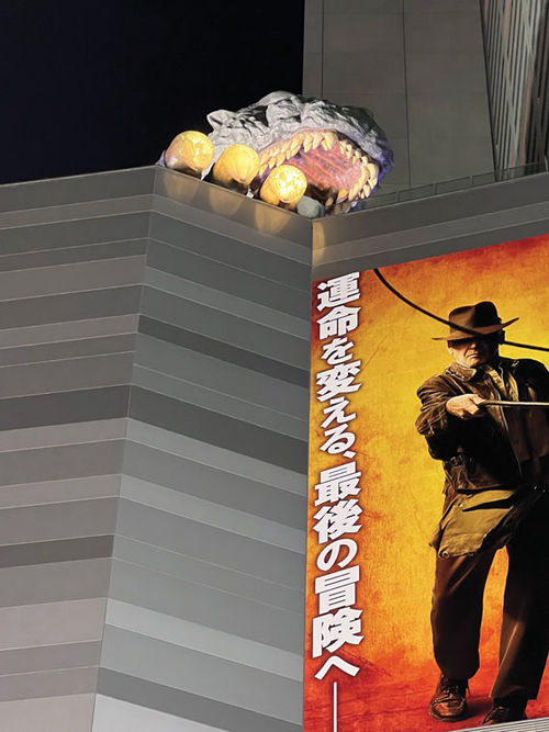 A Godzilla replica appears as if he's ready to take a bite out of Indiana Jones at Tokyo's Toho Cinemas. A Godzilla replica appears as if he's ready to take a bite out of Indiana Jones at Tokyo's Toho Cinemas.