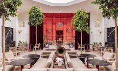 The Mache restaurant has stained-glass windows, lofty ceilings and a garden terrace.