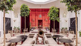 The Mache restaurant has stained-glass windows, lofty ceilings and a garden terrace.