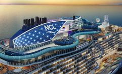 A rendering of the Norwegian Luna with its Slidecoaster stretching around the top deck.