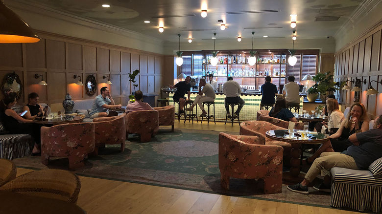 The lobby at the Palihouse Hyde Park Village doubles as a bar and a gathering space.