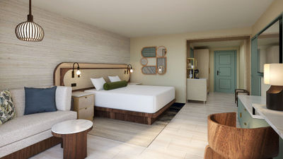 A rendering of a King Room at the Wyndham Grand Rio Mar Rainforest Beach & Golf Resort.