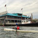 The pier in Yonkers, N.Y., with a kayaker bearing the initials for the Yonkers Paddling and Rowing Club on their life vest. Could this city, just up the Hudson River from Manhattan, one day host a river cruise ship?
