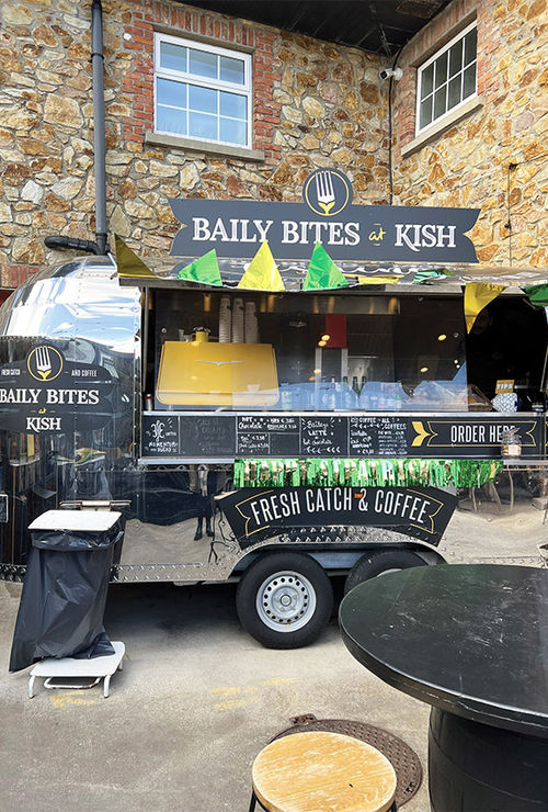 The Baily Bites trailer is part of Kish Fish, a seafood market on Howth Pier. The Baily Bites trailer is part of Kish Fish, a seafood market on Howth Pier.